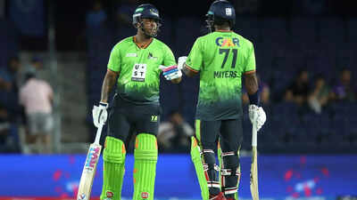 Hetmyer congratulated after reaching his fifty