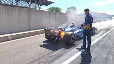 Carlos Sainz's car ablaze at the Austrian Grand Prix